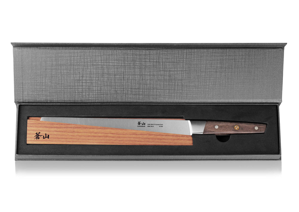 
                  
                    Cargar imagen en el visor de la galería, R Series 10.24-Inch Bread Knife with Ash Wood Sheath, Forged German Steel, 62649
                  
                