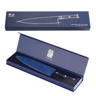 
                    
                      Blue 10-inch chef's knife with Damascus steel blade in open blue presentation box.
                    
                  