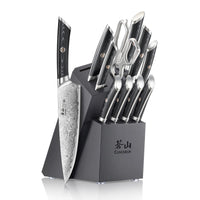 12-piece knife set with patterned blades, black handles, scissors, and a black angled wooden block with logo.