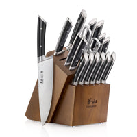 Wood block holding a 17-piece set of black-handled kitchen knives and utensils with stainless steel blades.
