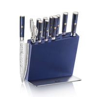 Blue knife block set holding eight knives and kitchen shears, with one knife displayed outside the block.