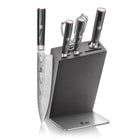Six-piece knife block set with four knives and two kitchen tools in a black wooden block with stainless steel base.
