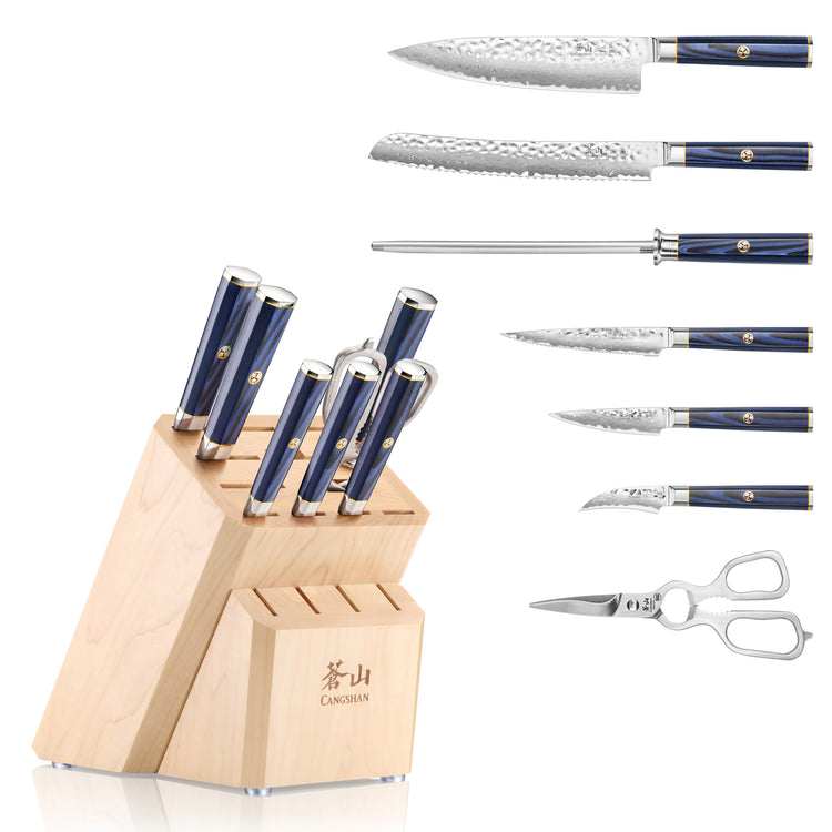 Eight-piece knife set with blue handles and Damascus steel blades, displayed with a 16-slot maple wood block and kitchen shea