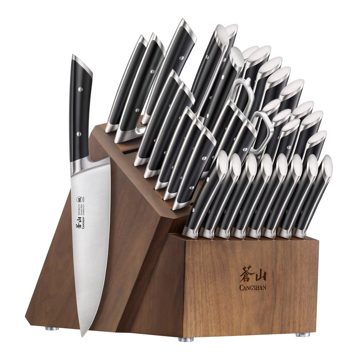 36-piece knife block set with black handles and stainless steel blades in a wooden block labeled Cangshan.