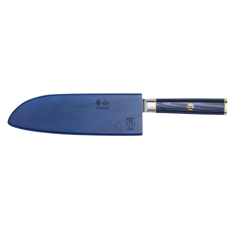Santoku knife with blue blade cover and blue-black handle with gold accents on white background.