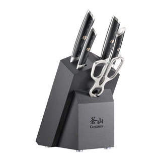 
                    
                      Six-piece knife set with black handles and stainless steel scissors in a black angled block labeled Cangshan.
                    
                  