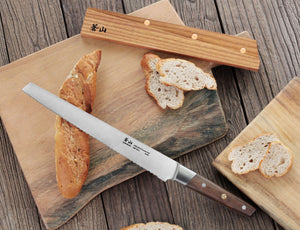 
                  
                    Load image into Gallery viewer, R Series 10.24-Inch Bread Knife with Ash Wood Sheath, Forged German Steel, 62649
                  
                