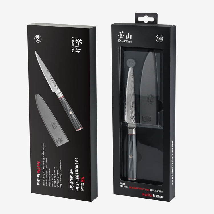 YARI Series 5-inch serrated utility knife with black handle and sheath in black retail packaging.
