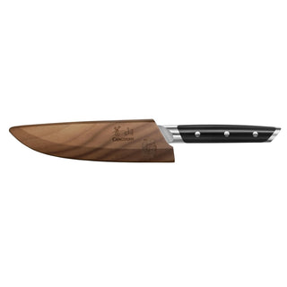 
                    
                      Serrated utility knife with black handle and wooden blade sheath featuring engraved logo and text.
                    
                  