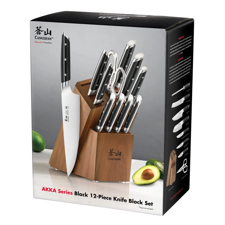 12-piece knife set with black handles in a wooden block, including kitchen shears and a sharpening rod.