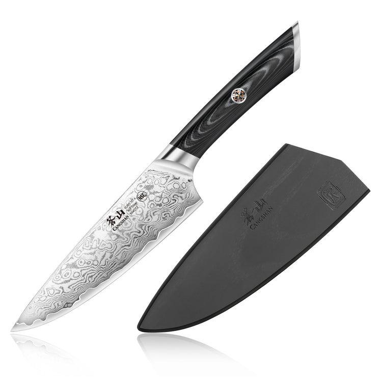 6-inch Damascus steel chef's knife with patterned blade and black handle, shown with a black protective sheath.