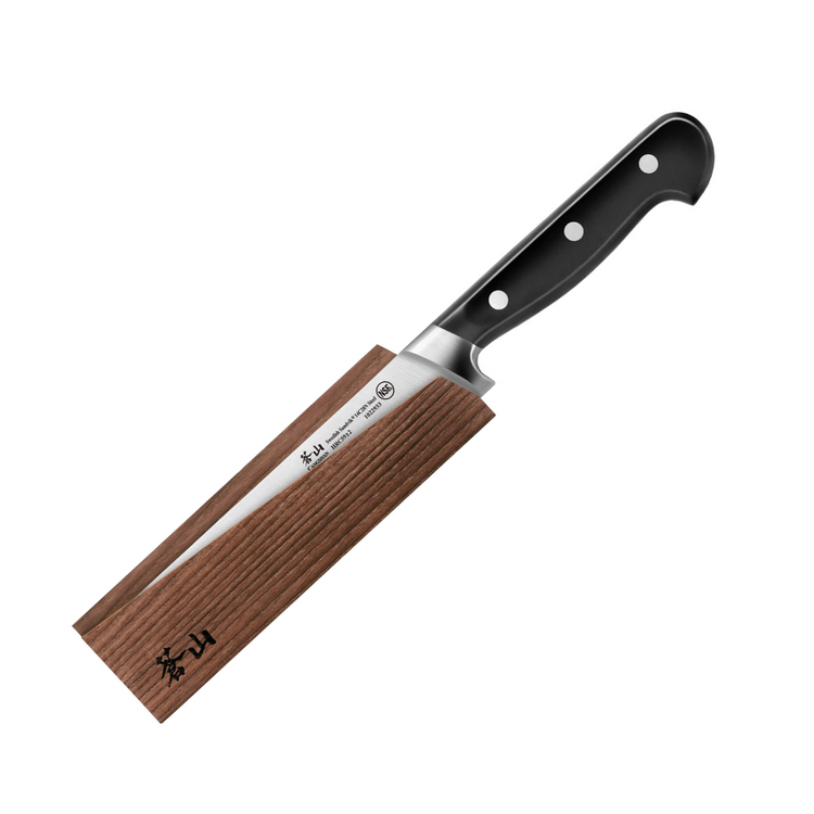 Knife with a black handle and three rivets in a wooden sheath with Japanese characters.