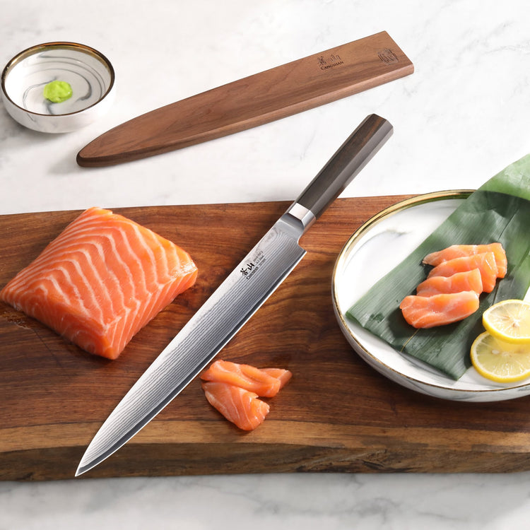 MAYA Series 10-Inch Sashimi Knife X-7 Damascus Steel on a cutting board with fresh salmon slices and a wooden sheath.