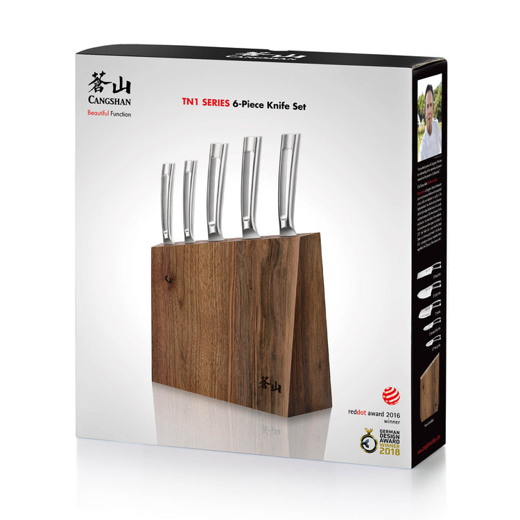 Six stainless steel knives with curved handles in a walnut wood block, displayed on product packaging.