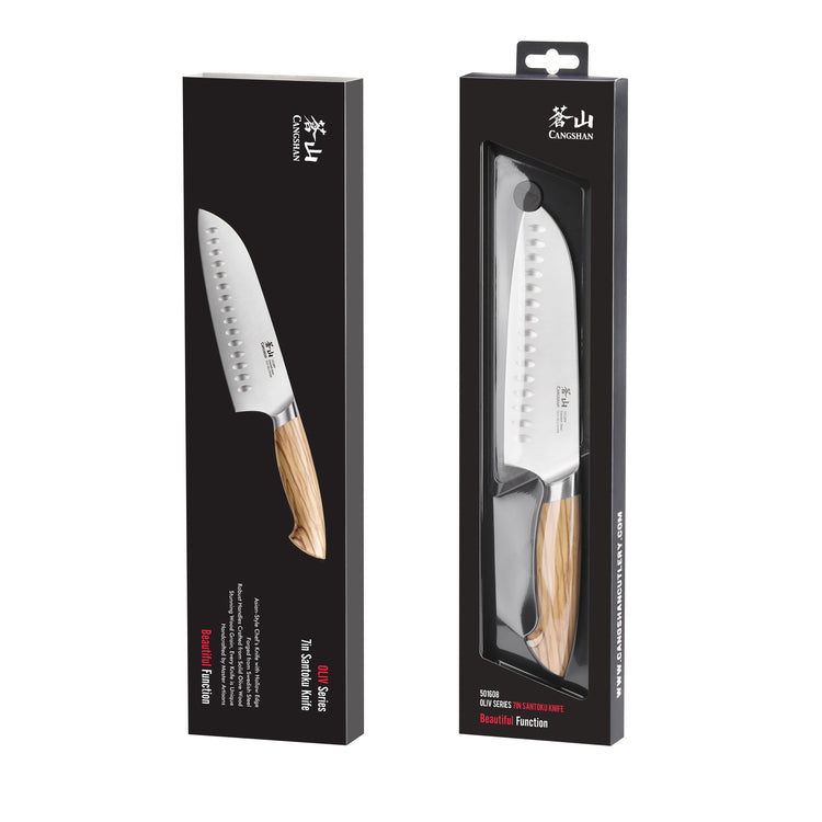 Santoku knife with a wooden handle and a stainless steel blade, shown inside and outside black retail packaging.