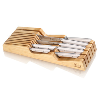 
                    
                      Eight stainless steel knives with silver handles arranged in a bamboo in-drawer knife organizer.
                    
                  