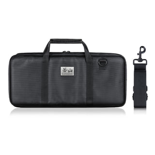 
                    
                      Black rectangular nylon knife bag with handles and detachable shoulder strap, closed and empty.
                    
                  