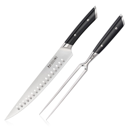 Carving knife with hollow edge and two-prong carving fork, both with black handles and metal rivets.