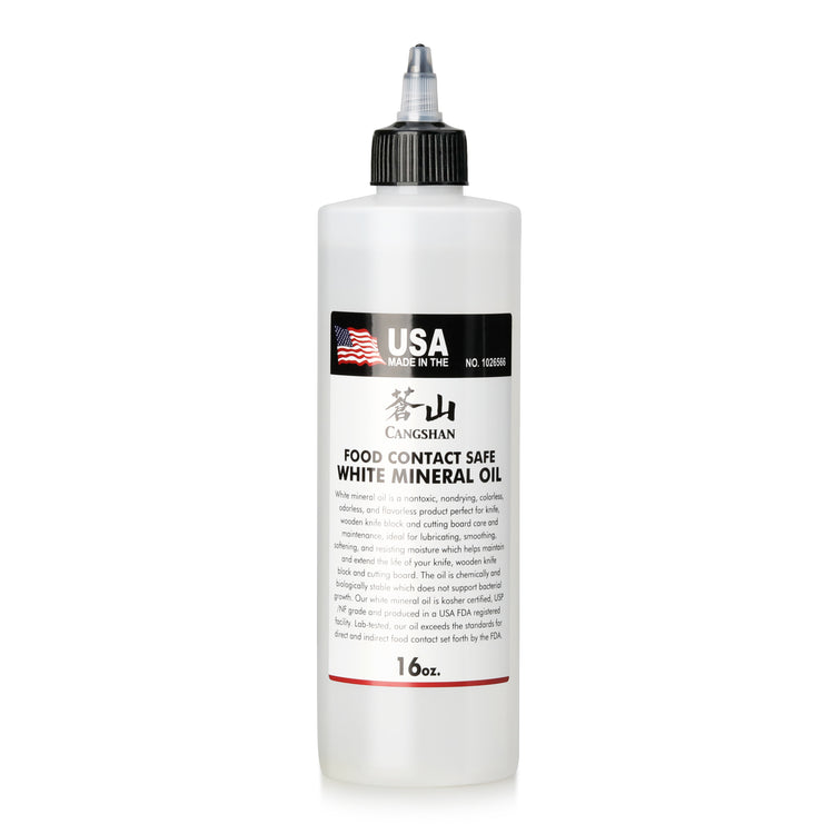 White 16oz squeeze bottle of food contact safe mineral oil with USA flag label and black twist cap.
