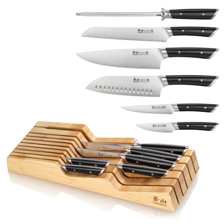 Seven-piece knife set with black handles and a bamboo in-drawer storage tray, including sharpening steel and various knives.