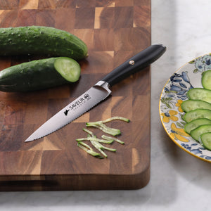 
                  
                    Load image into Gallery viewer, Saveur Selects 5-Inch Serrated Utility Knife, Forged German Steel, 1026238
                  
                