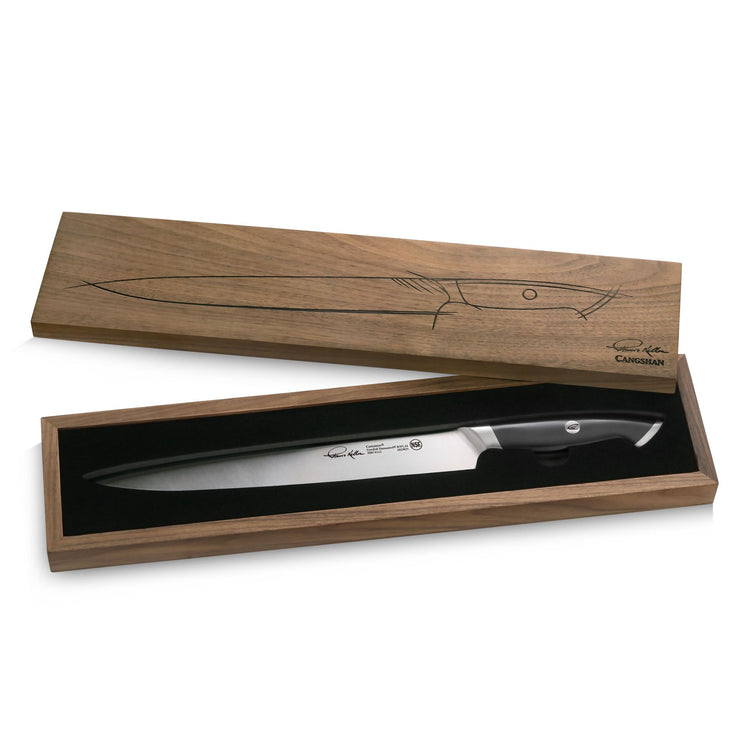 Black-handled carving knife with polished blade in a wooden presentation box with a knife outline on the lid.