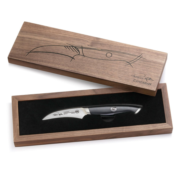Peeling knife with black handle in a wooden box featuring a line drawing of the knife on the lid.