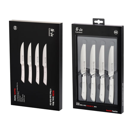 Four white-handled steak knives displayed in black retail packaging with clear front panel.