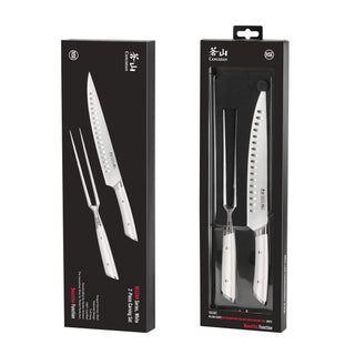 
                    
                      Two-piece carving set with a serrated knife and carving fork, both featuring white handles, displayed in black packaging.
                    
                  