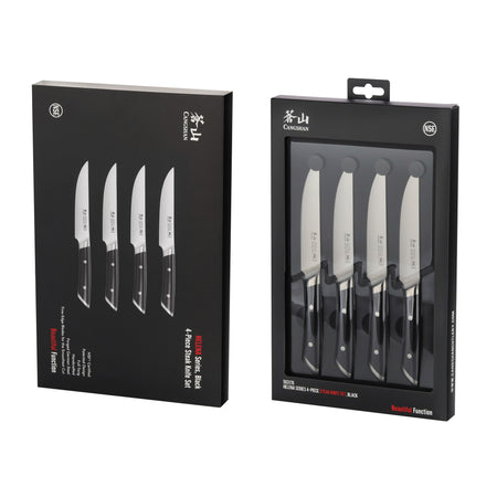 Four steak knives with black handles and stainless steel blades displayed in black packaging with clear front panel.