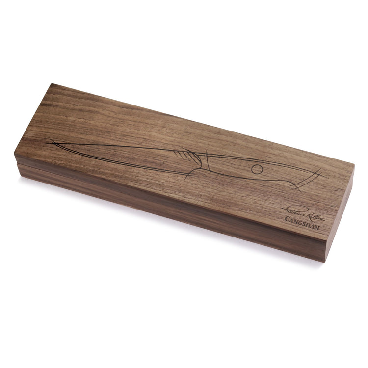 Rectangular wooden box with an engraved outline of a utility knife and signature on the lid.
