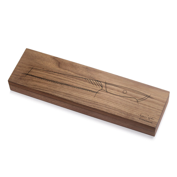 Wooden box with engraved outline of an 8-inch bread knife from the Thomas Keller Signature Collection.
